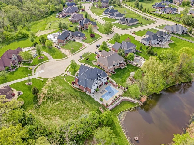 aerial view with a water view and a residential view