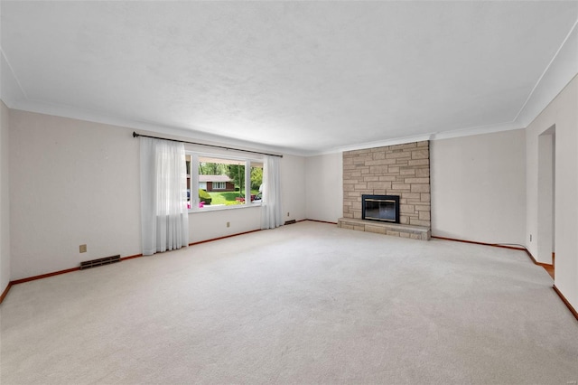 unfurnished living room with crown molding, visible vents, and carpet