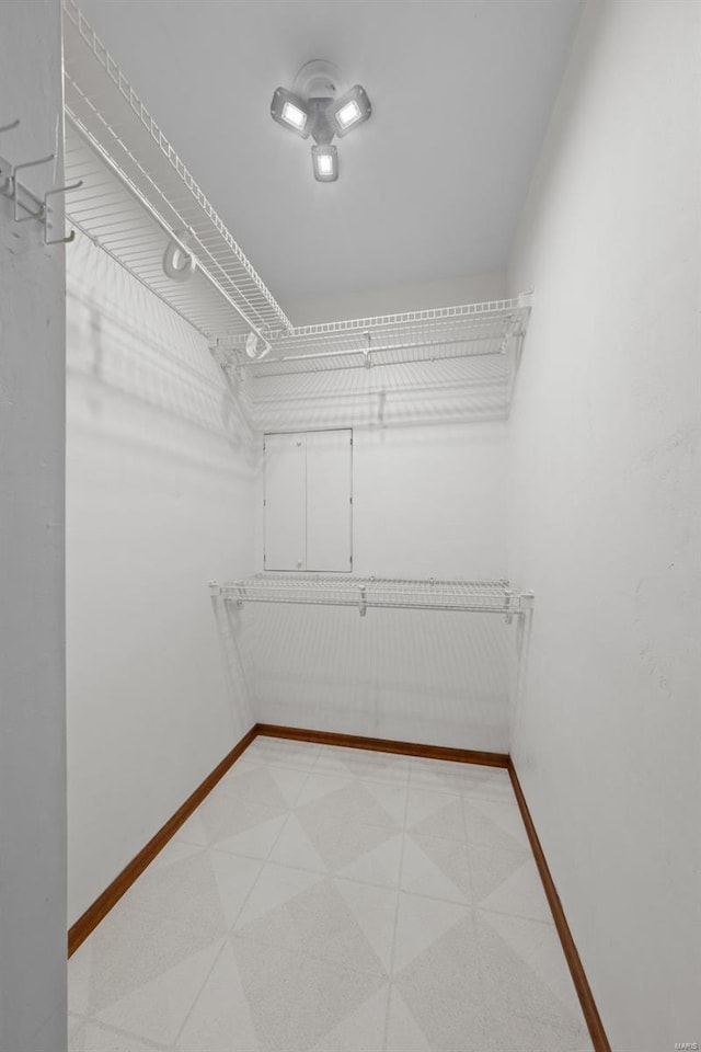 spacious closet with light floors