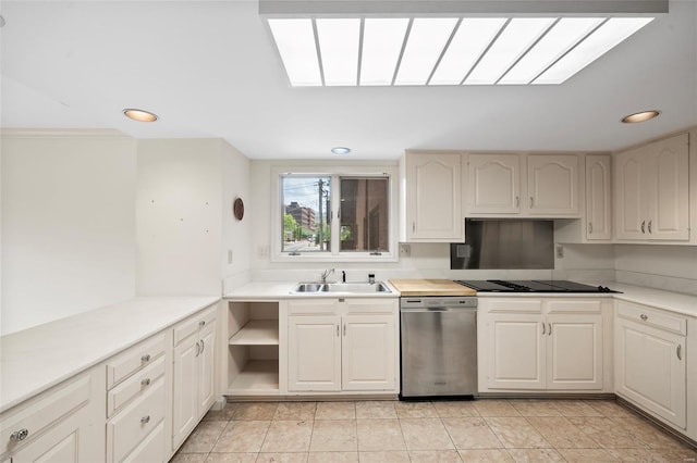 kitchen with stainless steel dishwasher, a sink, black cooktop, and recessed lighting