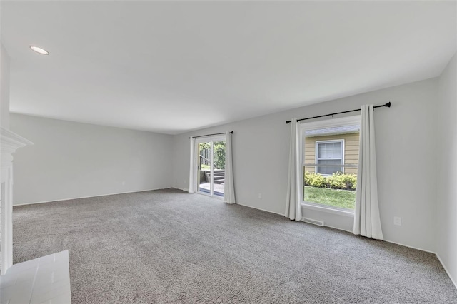 unfurnished room with carpet floors