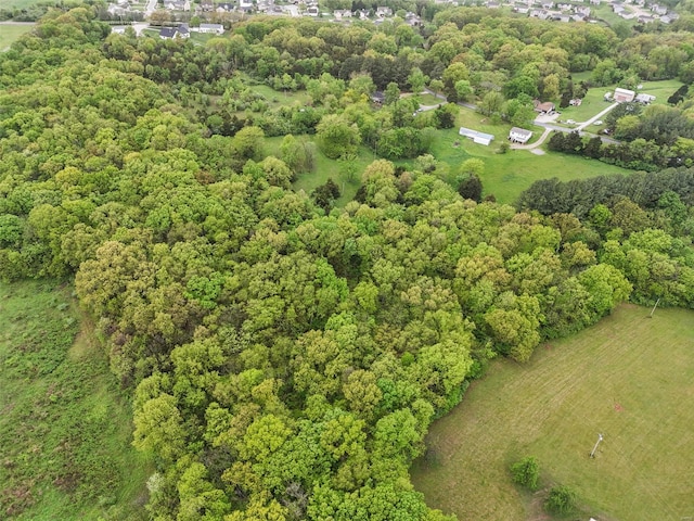 aerial view with a wooded view