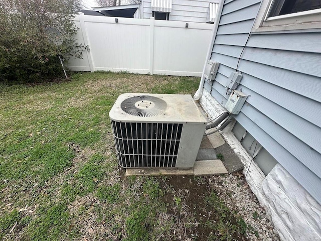 exterior details with fence and central AC