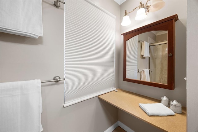 bathroom with an enclosed shower
