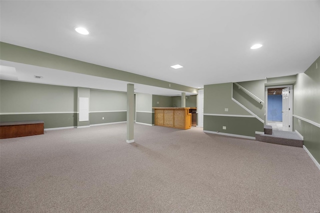 finished basement featuring baseboards, carpet, and recessed lighting