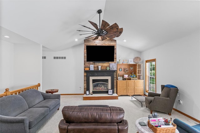 living room featuring a fireplace, visible vents, ceiling fan, and light carpet