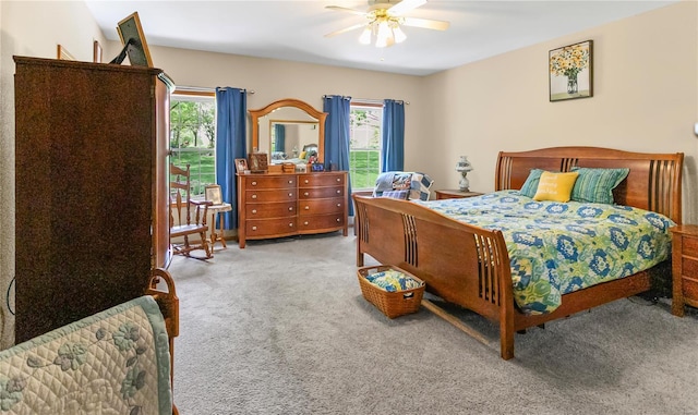bedroom featuring ceiling fan and carpet floors