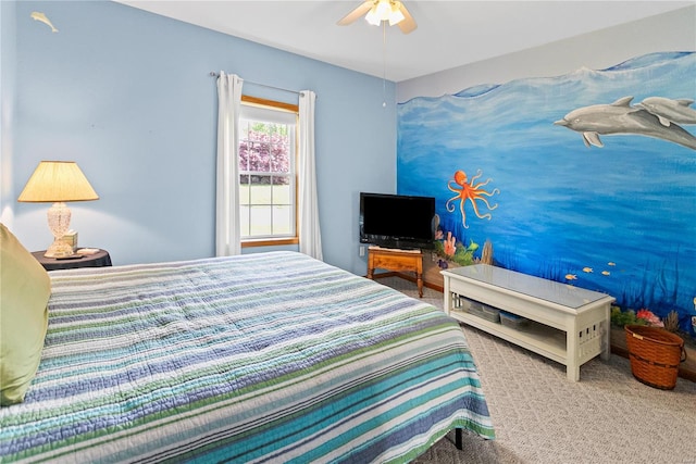 bedroom featuring ceiling fan and carpet floors