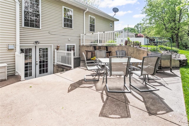view of patio featuring french doors and outdoor dining space