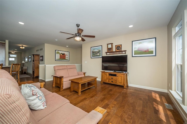 living area with baseboards, recessed lighting, dark wood-style flooring, and ceiling fan