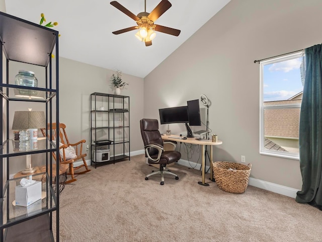 carpeted home office featuring a ceiling fan, baseboards, and high vaulted ceiling
