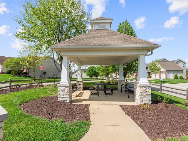 surrounding community with a residential view and a gazebo