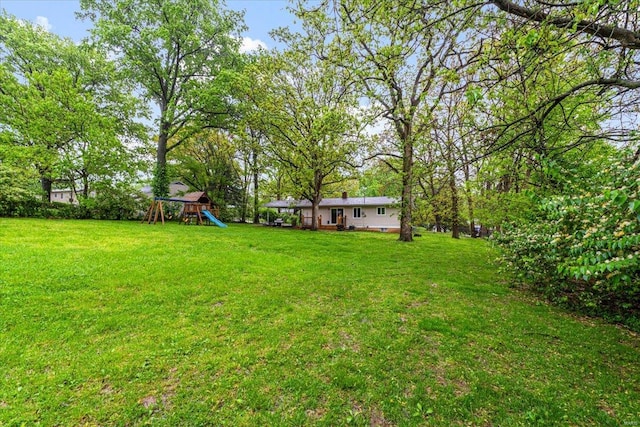 view of yard with a playground