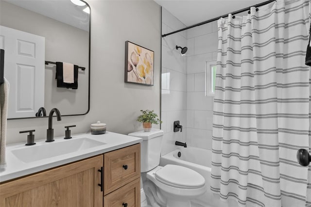 full bathroom featuring toilet, shower / bath combination with curtain, and vanity