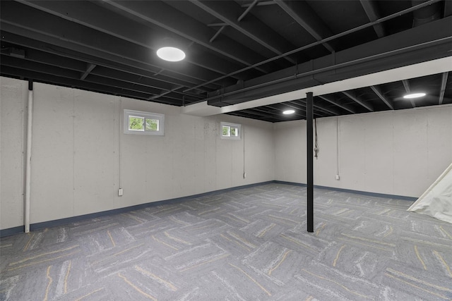 below grade area featuring carpet floors