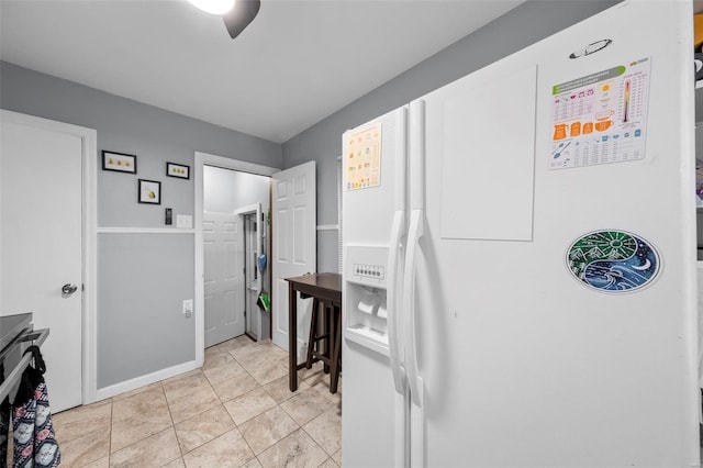interior space featuring baseboards
