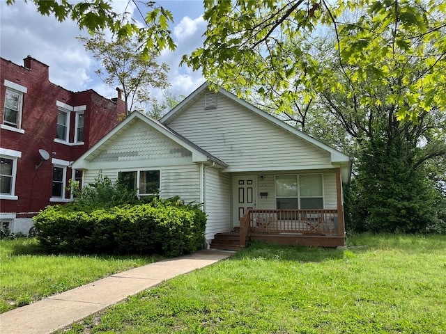 view of front facade with a porch and a front yard
