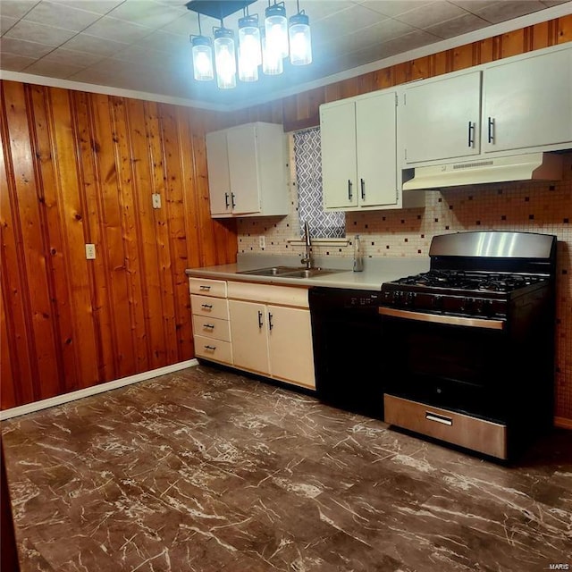 kitchen with decorative backsplash, a sink, under cabinet range hood, stainless steel gas stove, and black dishwasher