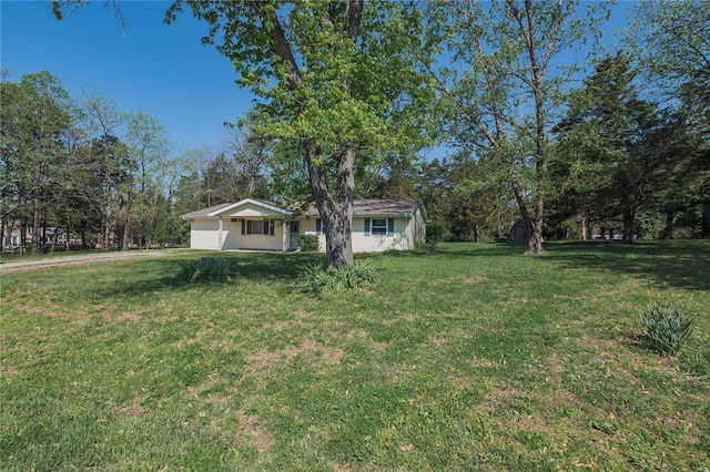 view of yard featuring an attached garage