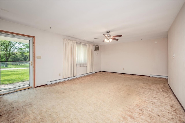 carpeted empty room with baseboards, a ceiling fan, a wall unit AC, and a baseboard heating unit