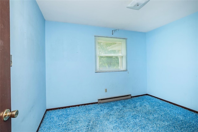 unfurnished room featuring a baseboard radiator, carpet, and baseboards