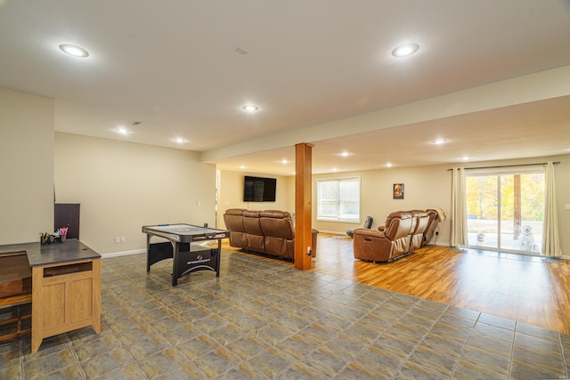 game room with recessed lighting, baseboards, and a healthy amount of sunlight