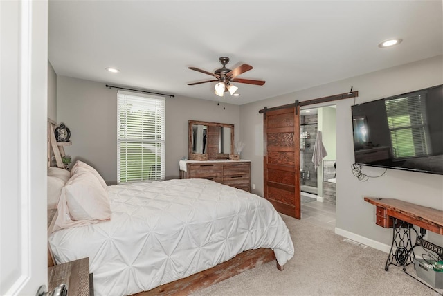 carpeted bedroom featuring recessed lighting, a barn door, baseboards, and ceiling fan