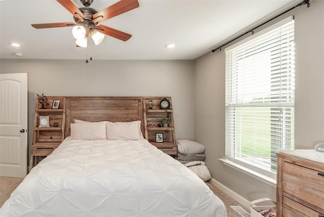 carpeted bedroom featuring recessed lighting, baseboards, visible vents, and ceiling fan
