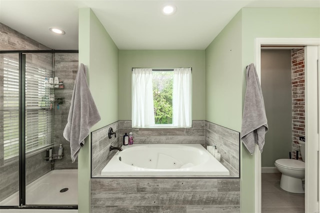 full bath with a shower stall, a tub with jets, baseboards, toilet, and recessed lighting