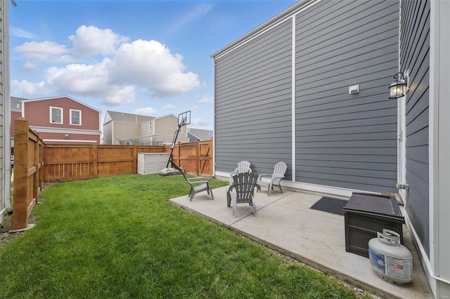 view of yard featuring a fenced backyard and a patio area