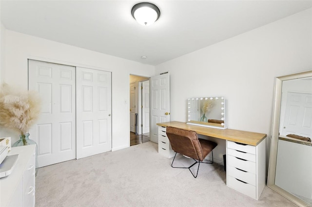 office area with light colored carpet