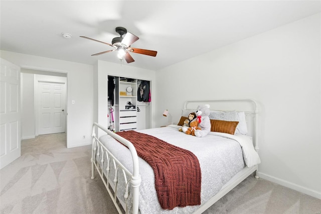 bedroom with baseboards, carpet, and a ceiling fan