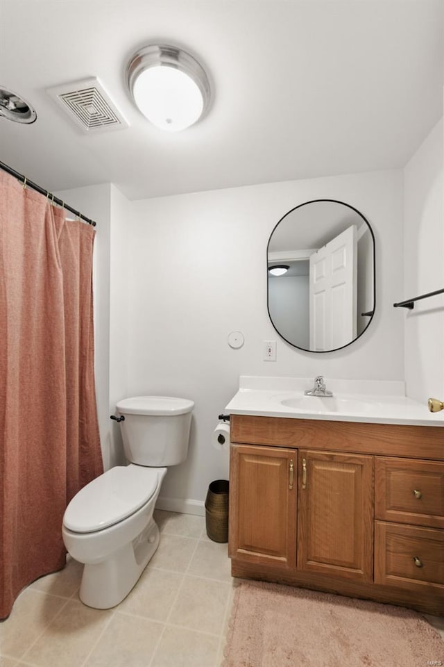 full bathroom featuring vanity, toilet, tile patterned floors, baseboards, and visible vents