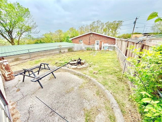 view of yard with a patio and a fenced backyard
