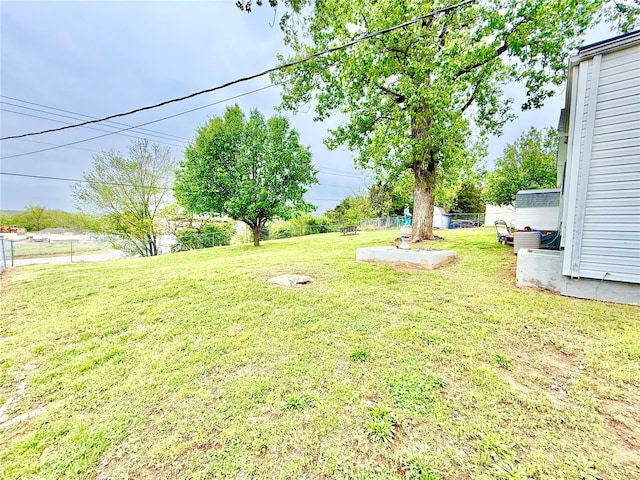 view of yard featuring fence
