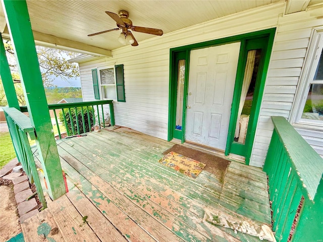 doorway to property featuring a ceiling fan