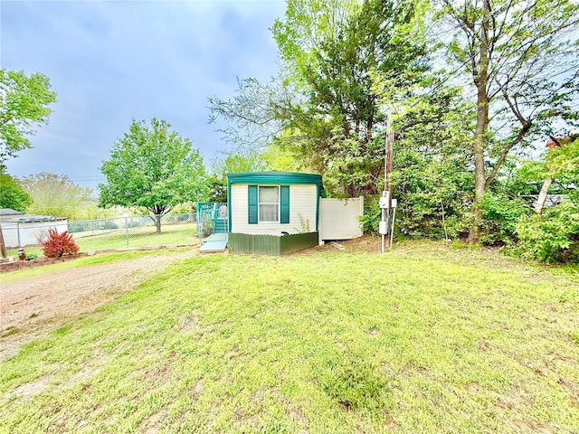 view of shed with fence
