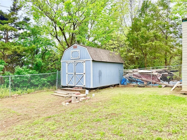 view of shed featuring a fenced backyard