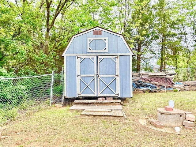 view of shed with a fenced backyard