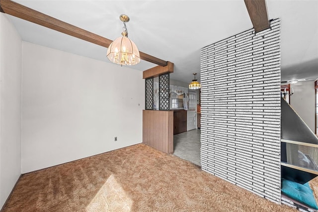 interior space with an inviting chandelier and beamed ceiling