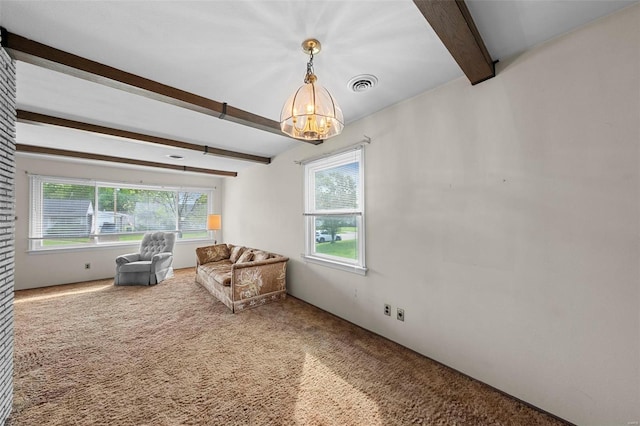 living area featuring carpet floors, a chandelier, beamed ceiling, and visible vents