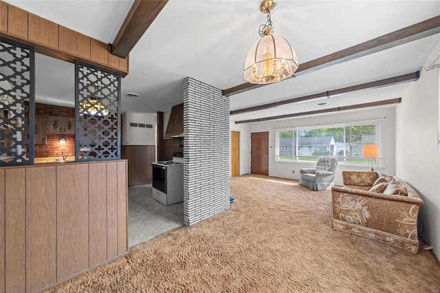 kitchen featuring a notable chandelier, carpet floors, white range with electric cooktop, open floor plan, and beamed ceiling