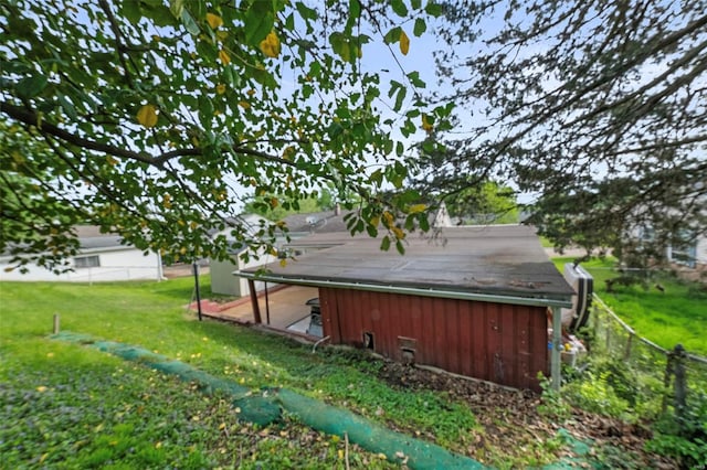 view of outdoor structure with fence