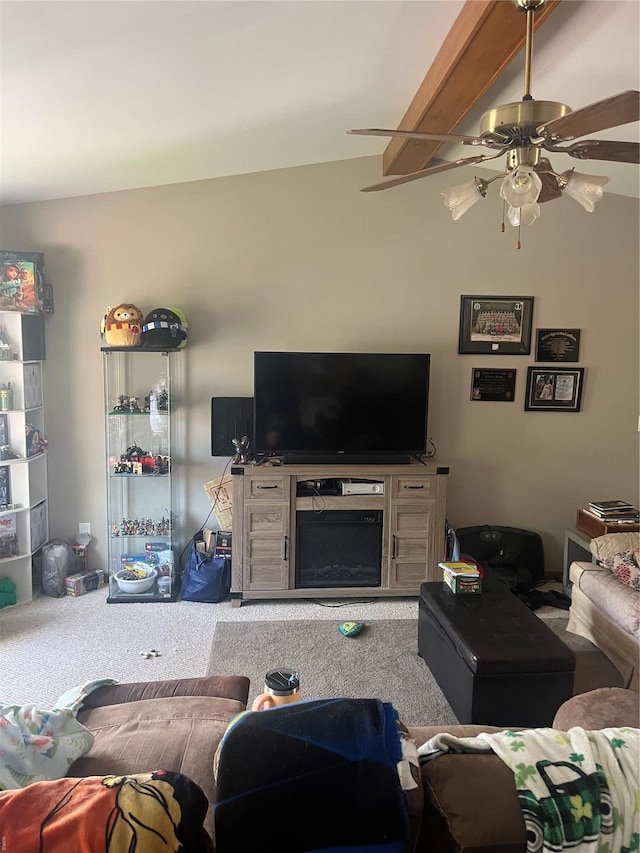 living room featuring carpet flooring, ceiling fan, and a fireplace