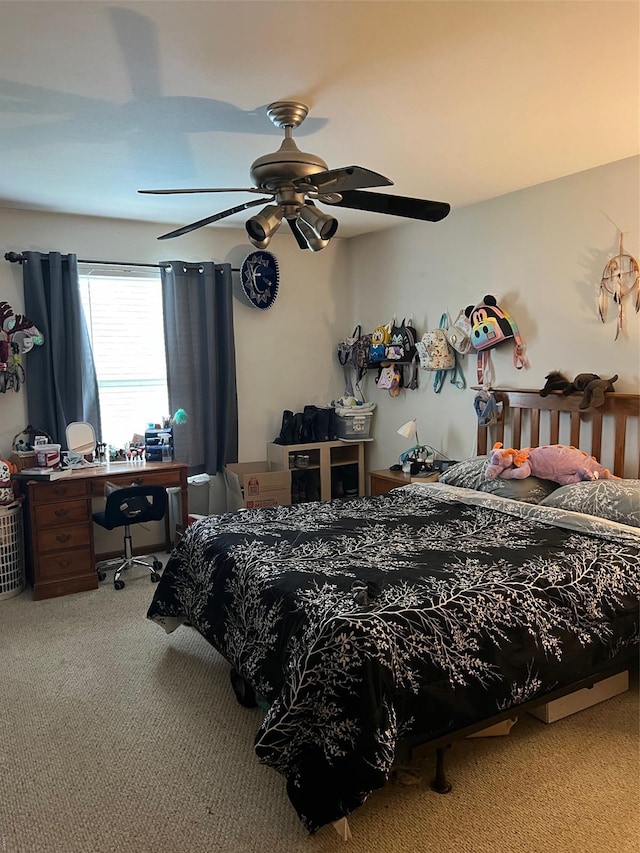 bedroom with ceiling fan and carpet