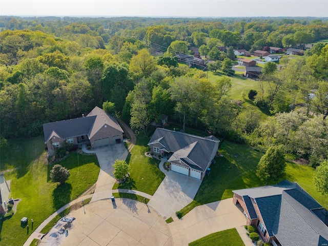 aerial view with a wooded view