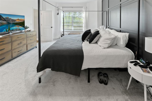 bedroom with light carpet