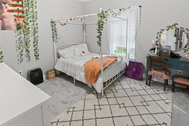 bedroom with light colored carpet