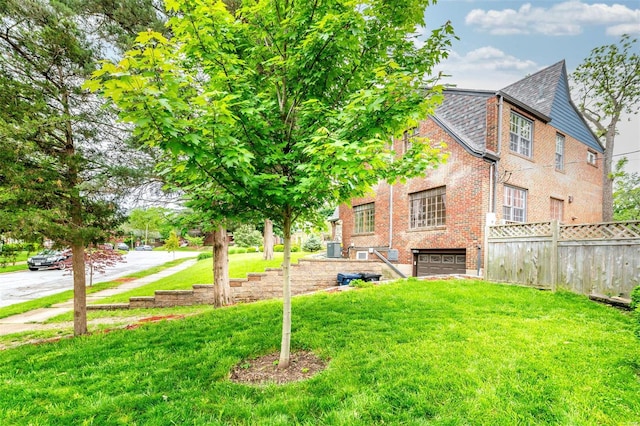 view of yard with a garage
