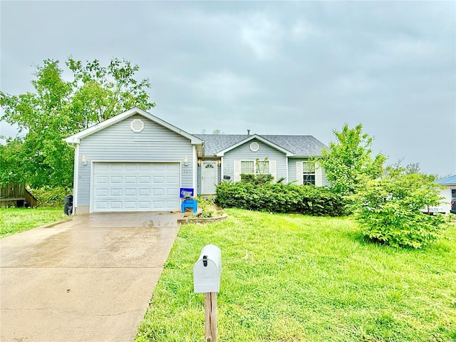 ranch-style home featuring a front yard, driveway, and an attached garage